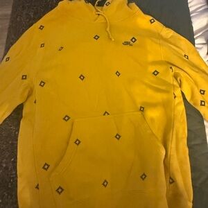 Nike Yellow Pullover Hoodie with Subtle Diamond Print